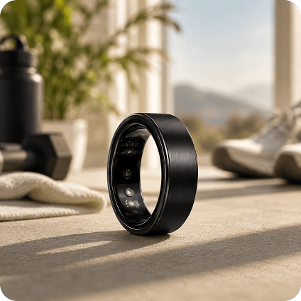 theera Forest smart ring in brushed green titanium on a stone surface